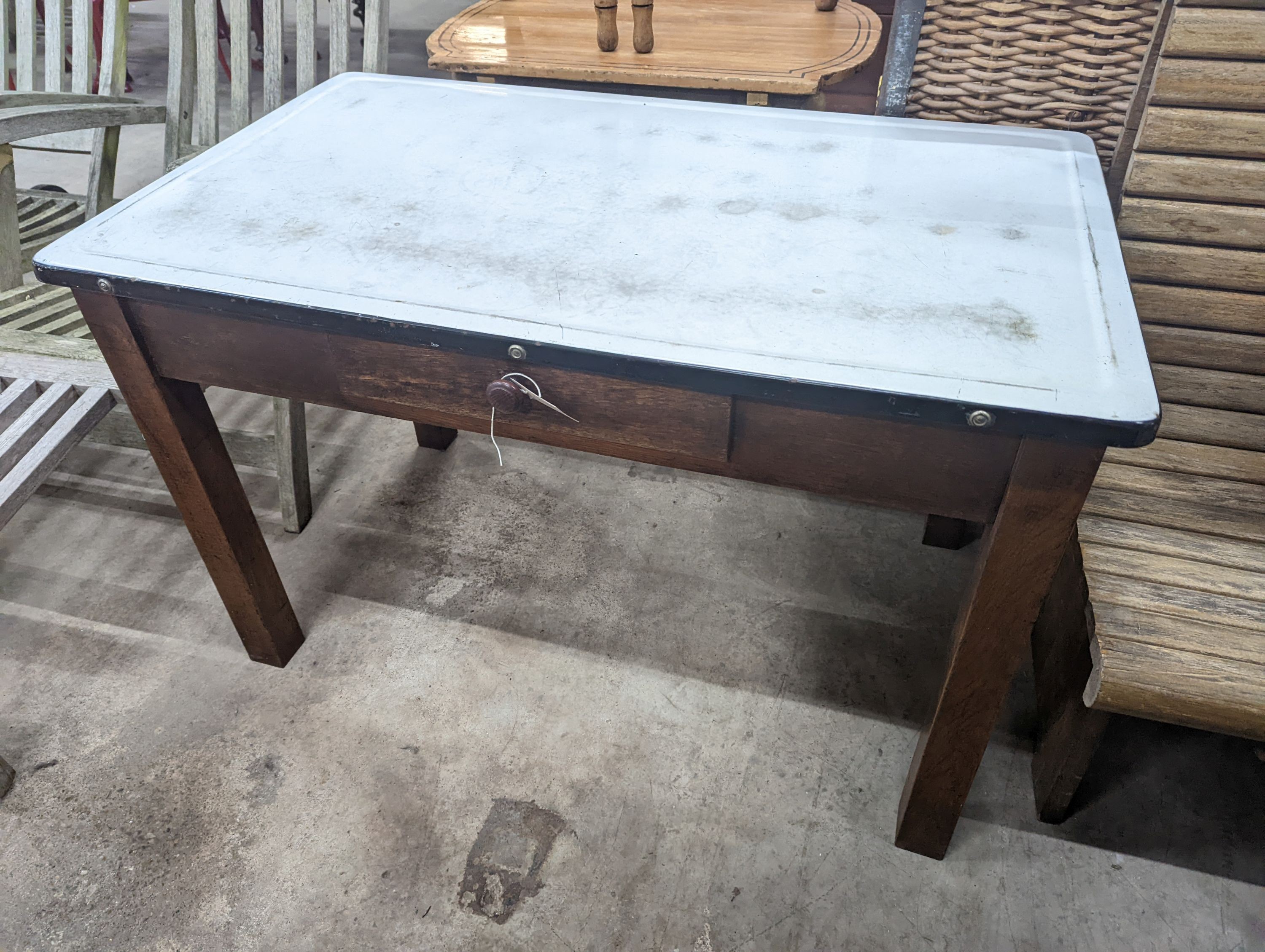 An enamel top kitchen table, width 105cm, depth 63cm, height 68cm